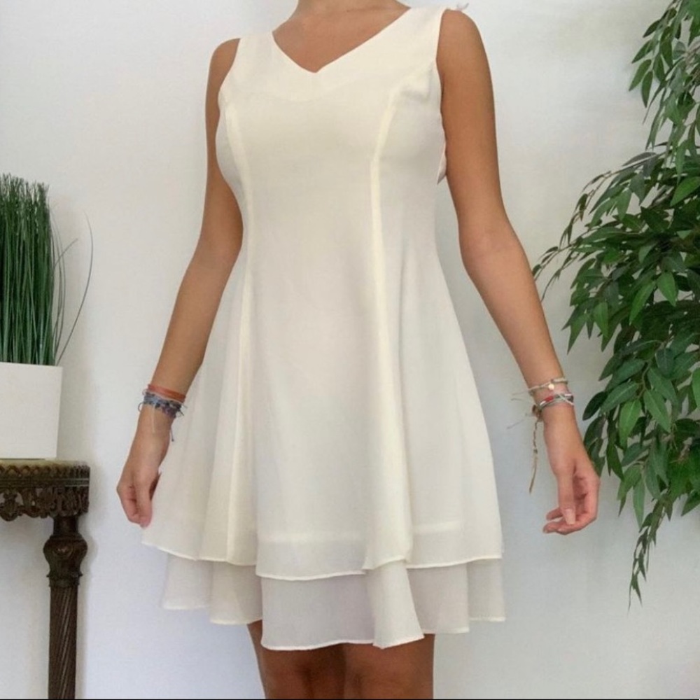Cream colored above the knee dress